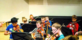 Training in Violin during summer camp learning violin