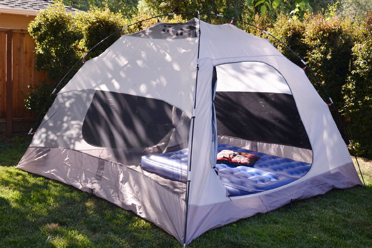 Set up a backyard camping tent